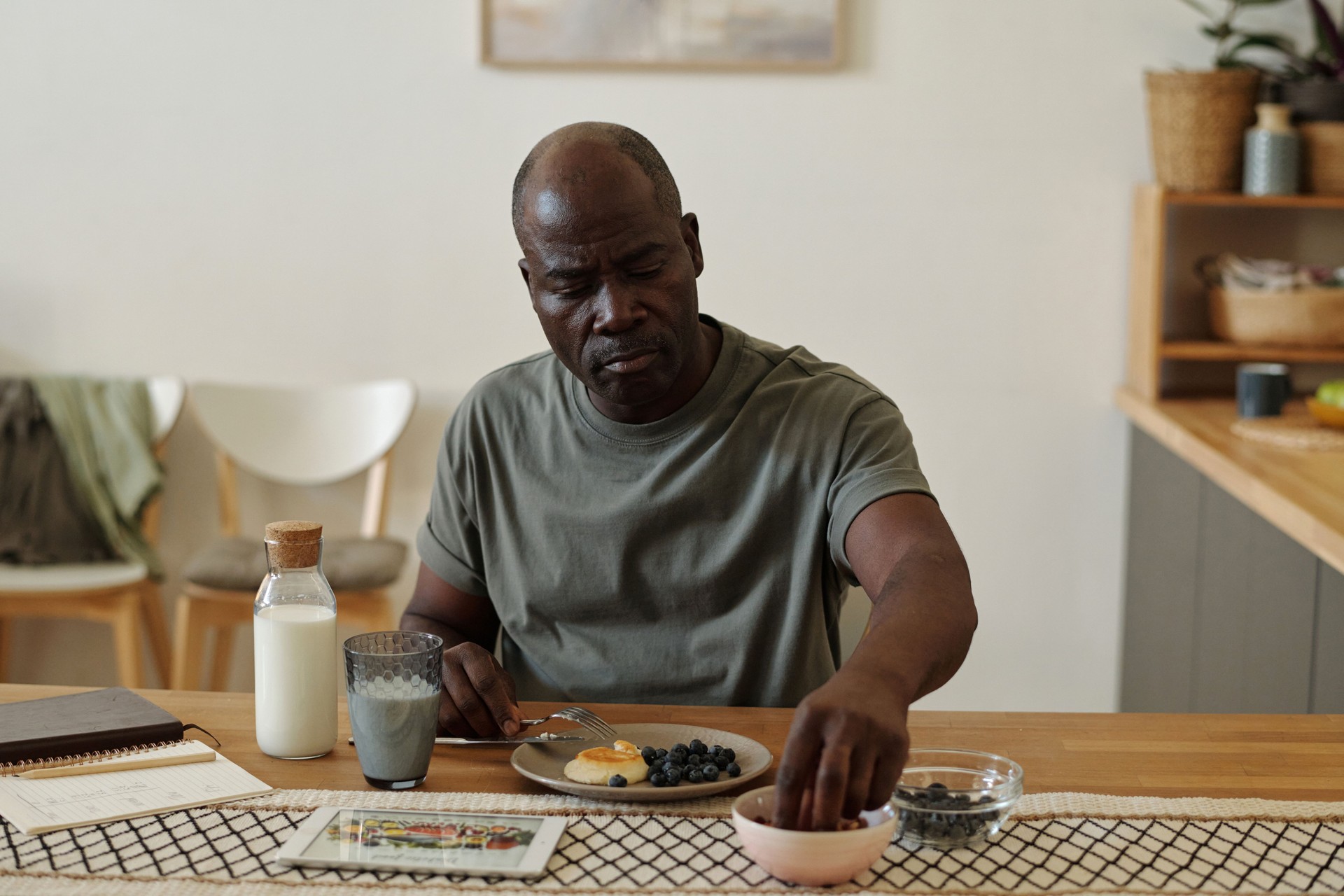 African American Man Enjoying Breakfast at Home